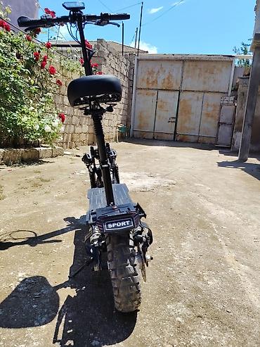 Elektrikli samokatlar: Elektrik skuter – off-road tipli, iri dişli təkərlər və güclü asqı — 1