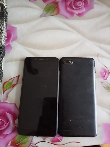 qara ekran şəkilləri: İki ədəd qara rəngli smartfon islemir redmi 6 a 2 dene - Ekran — 1