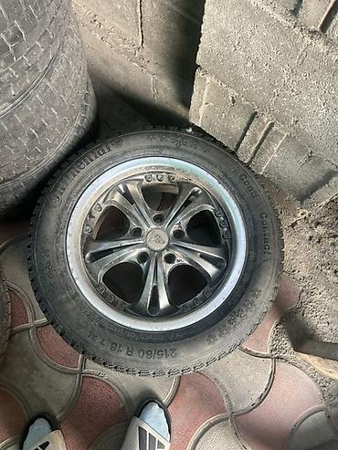 динам: Комплект автомобильных колес и шин. Состав: - Литые диски Toyota — 3