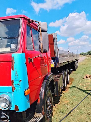 niva mostu satilir: KAMAZ dartqı maşını və uzun bortlu yarımqoşqu - Marka/model: KAMAZ — 6