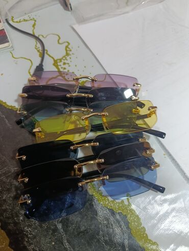 optik eynek modelleri: Rimless gün eynəkləri kolleksiyası - Forma: düzbucaqlı, kənarları