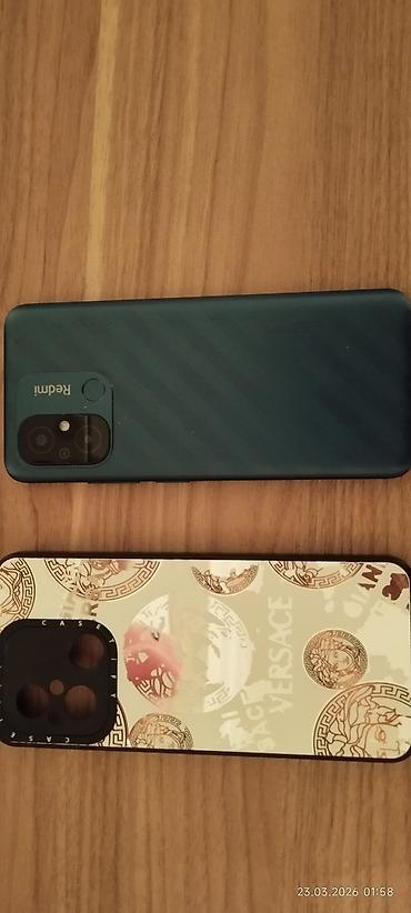 işlənmiş kamera: Redmi 12C, 128 GB, rəng - Mavi, Barmaq izi, İki sim kartlı, Face ID — 1