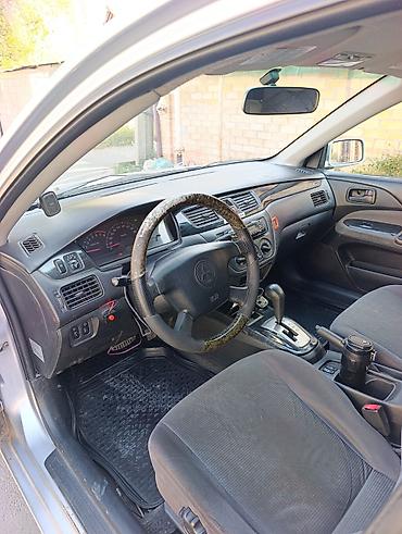 mitsubishi lancer 2006: Mitsubishi Lancer: 2002 г., 1.6 л, Автомат, Газ, Седан — 6