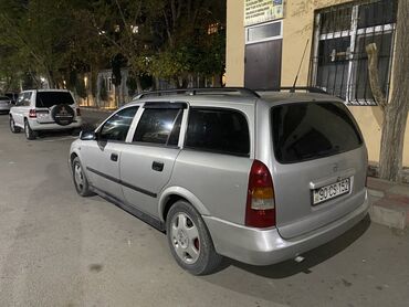 диски колесные легкосплавные таврия: Opel Astra Caravan (universaI) – gümüşü rəngdə, 5 qapılı ailə və yük