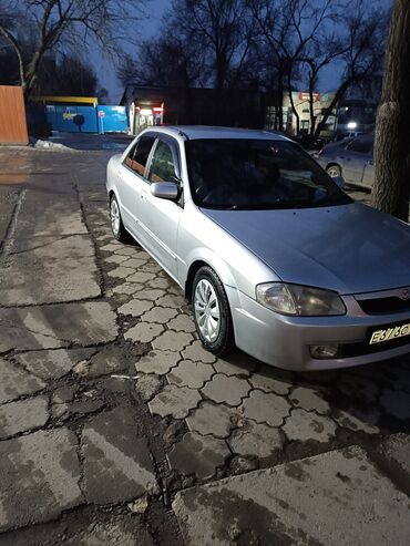 Mazda: Mazda Familia: 1998 г., 1.5 л, Автомат, Бензин, Седан