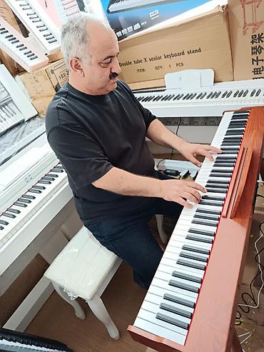 Digər: Elektro Pianino Qəhvəyi rəngli 88 klaviş tam oktava Pianino səslidir 4 — 5