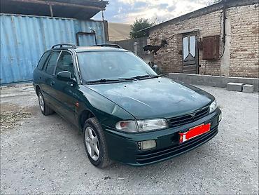 пш метр: Mitsubishi Lancer: 1999 г., 1.6 л, Кол менен иштөөчү, Бензин, Универсал — 7