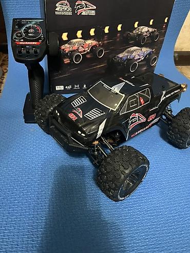 Радиоуправляемый внедорожный трак 1/14(4WD) DUANGRC Комплектация: -