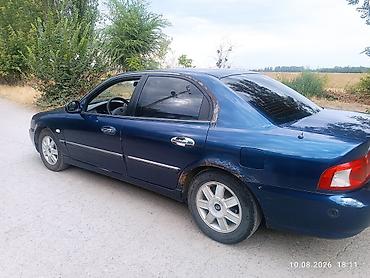 выбор номера о: Kia Magentis: 2003 г., 2 л, Механика, Бензин, Седан — 3