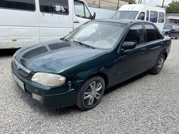 Легковой транспорт: Mazda Protege: 2000 г., 1.5 л, Автомат, Бензин, Седан