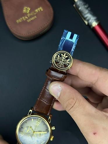 Наручные часы: Klassik dizaynlı kişi qol saatı - Korpus: qızılı tonlu dairəvi metal — 6