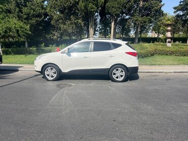 Hyundai: Hyundai Tucson: 2 l | 2012 il Universal