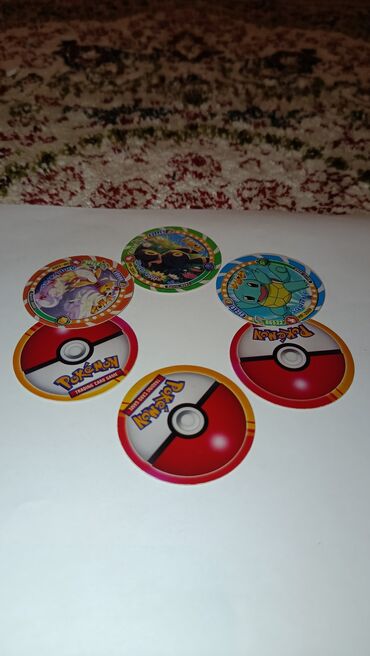 Настольные игры: Коллекционные игровые фишки Pokémon (POG/молнии) - Набор круглых