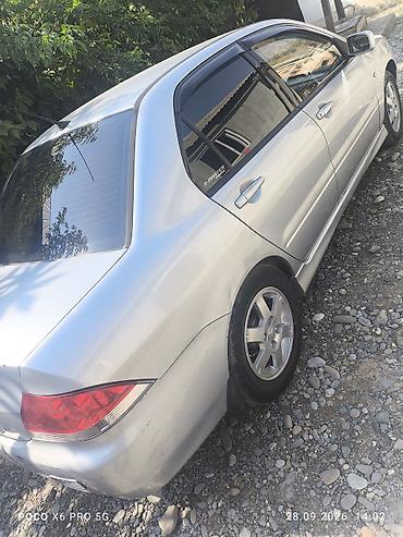 митсубиси эрв: Mitsubishi Lancer: 2004 г., 1.6 л, Автомат, Бензин, Седан — 8