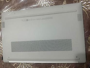 mini notebook: HP noutbuk satılır. Korpus gümüşü rəngdədir, zərif və müasir dizayna — 7
