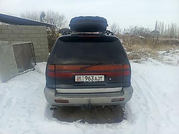 Другие автомобили: Минивэн с багажным боксом на крыше Основные характеристики по фото: - — 8