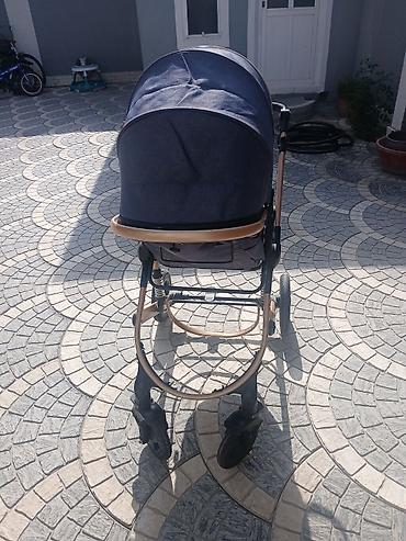 Uşaq arabaları: Uşaq arabası – Belecoo markası, tünd mavi parça və qızılı-bronz rəngli — 2