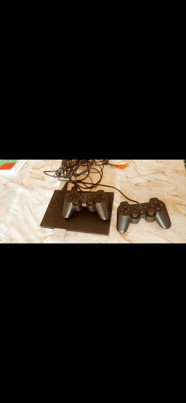 playstation 2 satisi: Pleystation 2 Sony satilir .45m unvan Yasamal (085) Fatoş