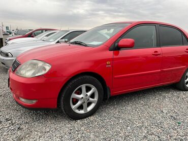 тойота корола 2005: Toyota Corolla седан (E120), ярко‑красный цвет кузова. Основные