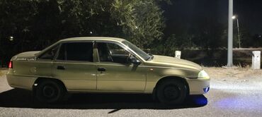 опел вектора б: Автомобиль Daewoo Nexia в кузове седан, окрашенный в светло-бежевый