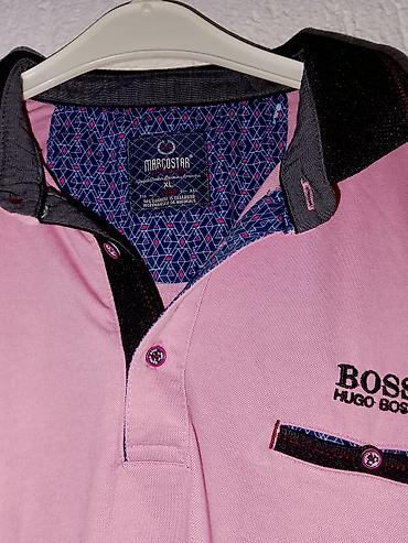 Majice: Muške polo majice – 2 komada Svaka majca po 600dinara 1) Infinity Man — 8