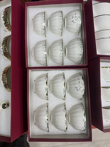 Наборы посуды: Фарфоровые чайные наборы в подарочных коробках. Варианты: - Набор с — 4