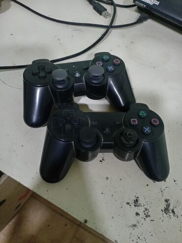 xbox one s: PlayStation 3 (PS3) Super Slim oyun konsolu və 2 ədəd DualShock 3