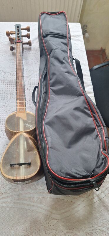Духовые инструменты: Məhsul: Tar (Azərbaycan milli simli musiqi aləti) Təsvir: - Klassik