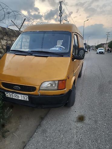 Ford: Ford Transit sarı rəngli yük/miniven. Xüsusiyyətlər: - Kuzov tipi — 1