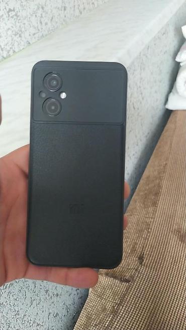 poco c51: Poco M5, 128 GB, rəng - Mavi, Barmaq izi, Simsiz şarj, Face ID — 3