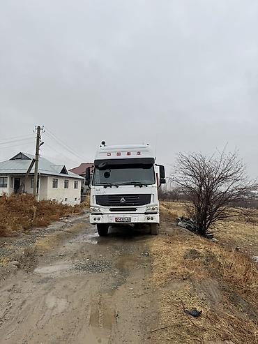 Тягачи: Тягач, Howo, 2012 г., Бортовой — 2