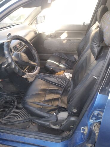 Mazda: Mazda 121: 1994 г., 1.3 л, Механика, Бензин, Кабриолет