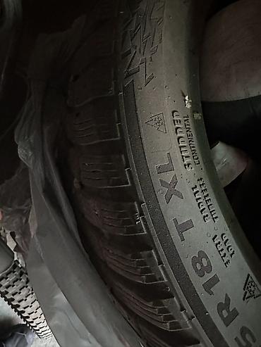 r18 235: Комплект зимних шин с шипами Continental - Размер: 235/45 R18 - — 3