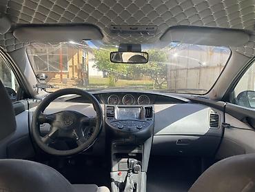 Унаа сатуу: Nissan Primera: 2003 г., 1.8 л, Кол менен иштөөчү, Лифтбек — 10