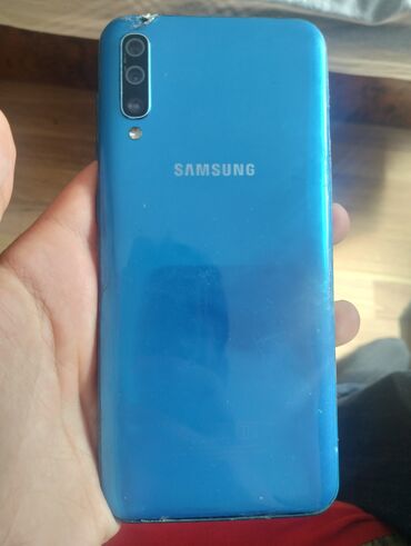Samsung: Samsung Galaxy A70, цвет - Синий, Сенсорный