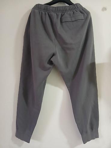 dugacke pantalone: L vel Nike muške trenerke – model sa logotipom - Boja: tamno siva - — 2