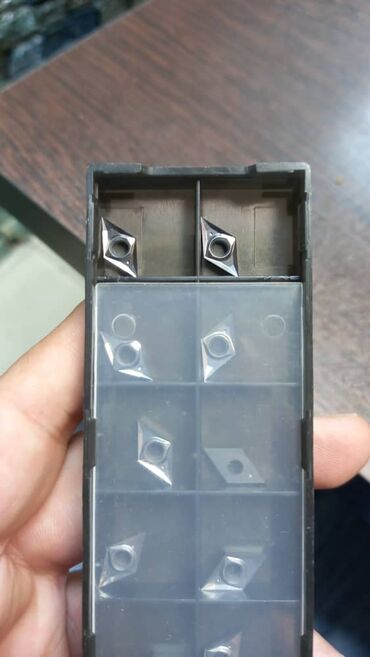 İstehsal avadanlığı: Dəzgah alətləri və kəsici lövhəciklər (freze və torna üçün) — 38