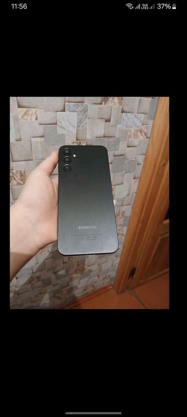 işlənmiş samsung telefonları: Samsung Galaxy A14 5G, 128 GB, rəng - Qara, Barmaq izi, İki sim kartlı, Face ID