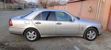 07 masin sekilleri: Mercedes-Benz C 230: 2.3 l | 1997 il Sedan