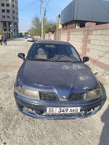 спринтер бортовой дубль: Седан синего цвета, 4 двери, государственные номера KG 349 AKG (регион — 1