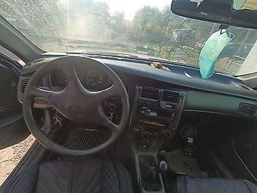 авто чанган: Toyota Carina E: 1997 г., 1.6 л, Кол менен иштөөчү, Бензин, Седан — 5