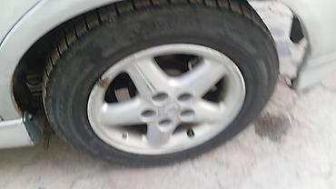 Nissan: Nissan Tino: 2001 г., 1.8 л, Автомат, Газ, Хэтчбэк — 4