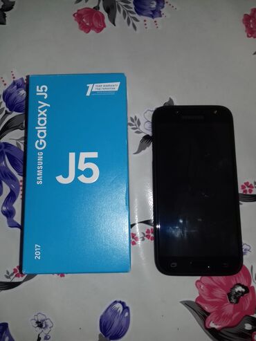 islənmis telefonlar: Samsung Galaxy J5, 16 GB, rəng - Qara, Barmaq izi, İki sim kartlı