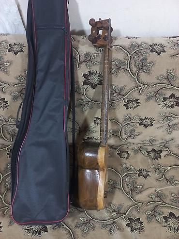 gitara simləri: Tar – yumru gövdəli, uzun saplı Azərbaycan xalq musiqi aləti — 2