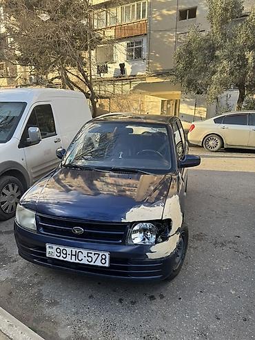 Microcar: Kompakt şəhər avtomobili – 3 qapılı hatchback. Xarici: - Tünd mavi — 2