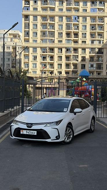 икс трейл: Toyota Corolla: 2022 г., 1.8 л, Вариатор, Гибрид, Седан — 2