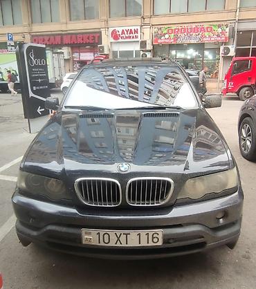 niva 4 qapili: BMW X5 (E53) – qara eksteryer, qırmızı dəri salon - Kuzov: SUV, qara — 7