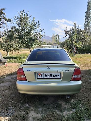 мата секыл: Mazda 323: 2000 г., 1.6 л, Автомат, Бензин, Седан — 2