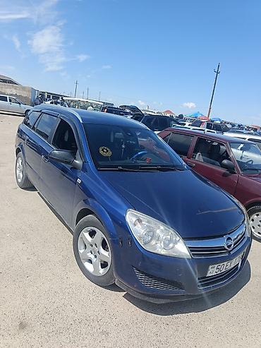 mersedes qapi: Opel Astra H Caravan (universal), tünd mavi rəng. - Kuzov: 5 qapılı — 1
