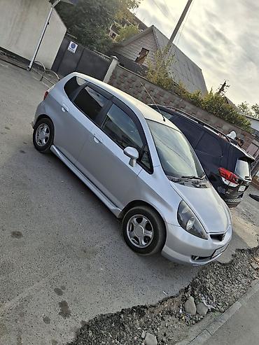roewe er6: Honda Fit: 2002 г., 1.3 л, Автомат, Бензин, Хэтчбэк — 2